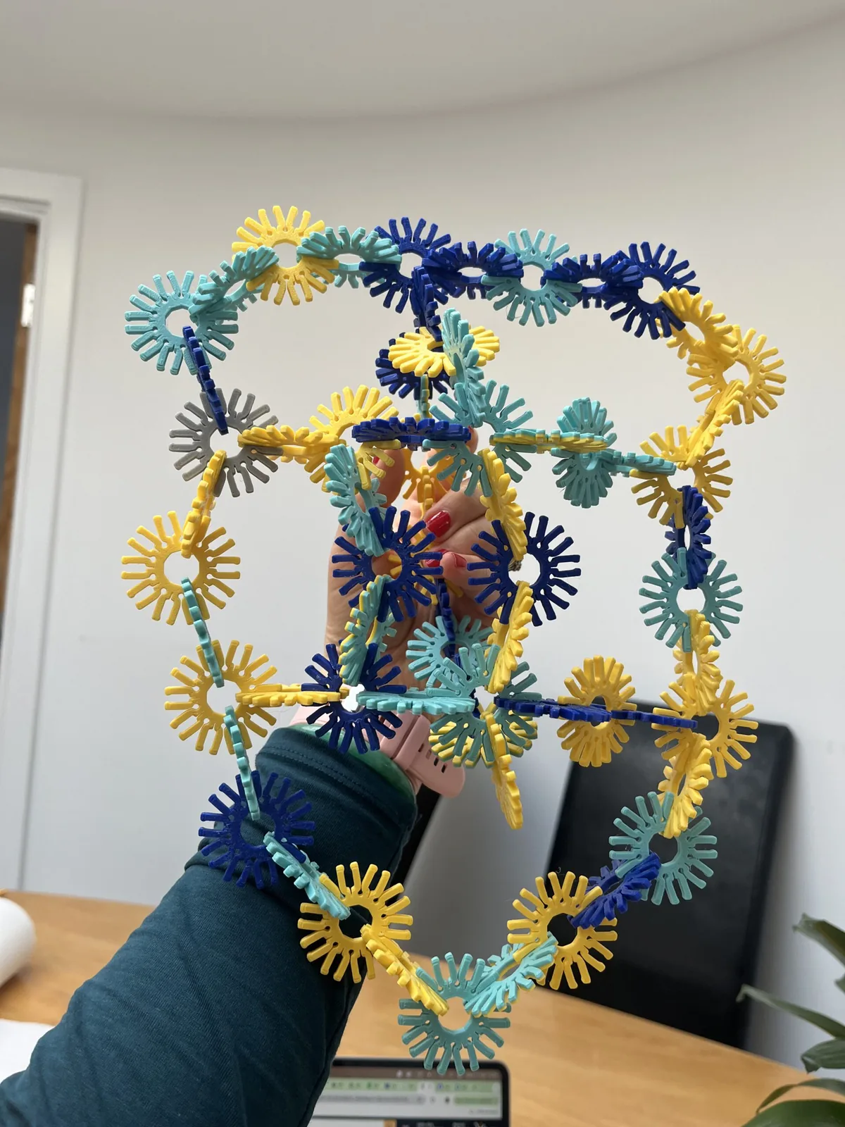 A big snowflake sphere held up high